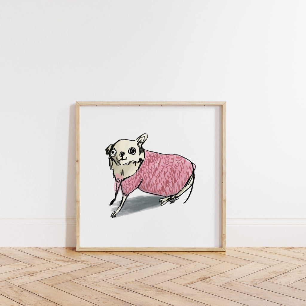 Chihuahua in pink jumper drawing on white background in an oak frame resting on wooden floor